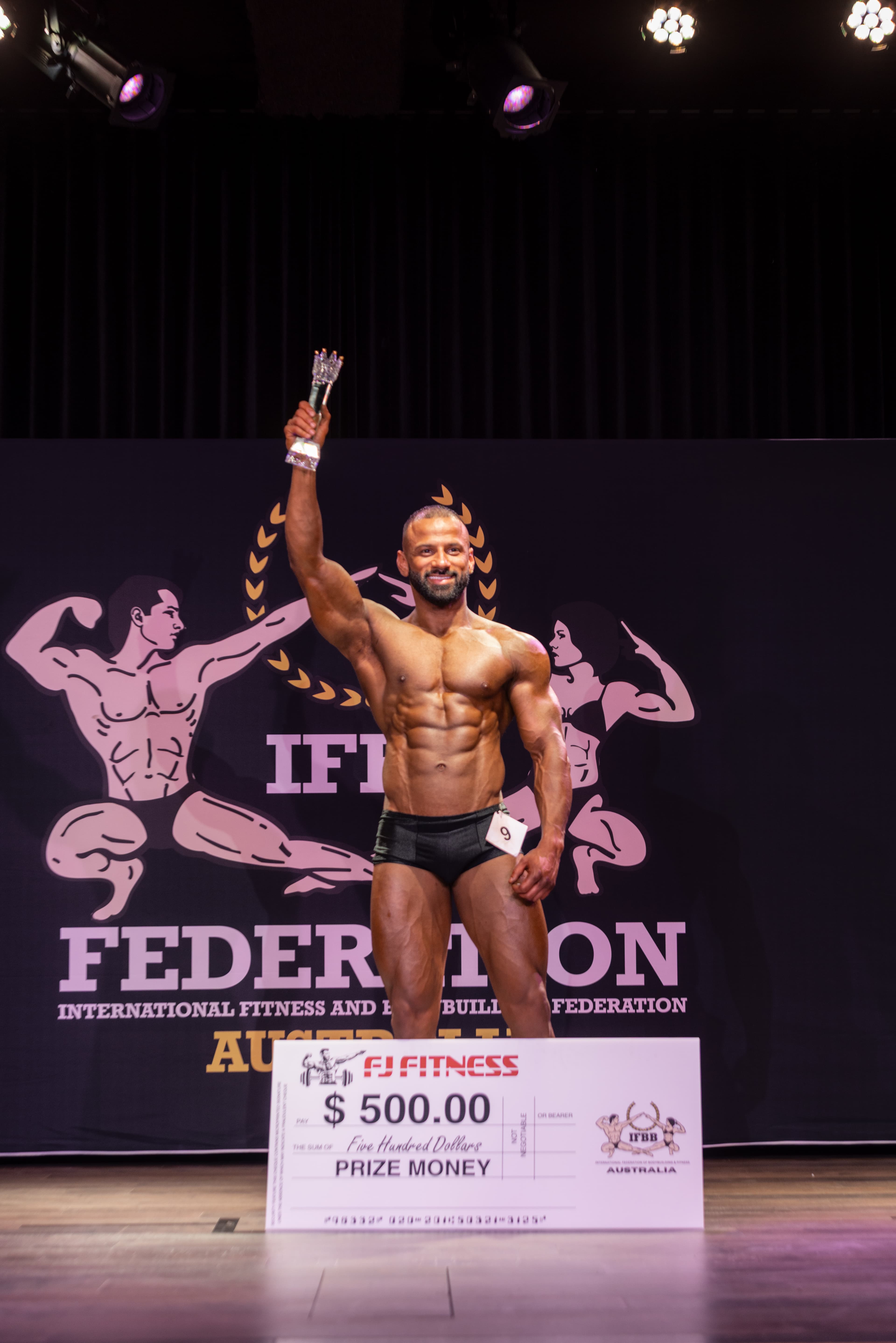 Puneet winning IFBB competition with $500 prize money